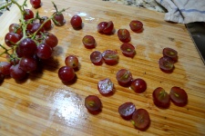 Cut each grape